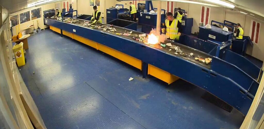 A Li-ion battery 'going off' on a MRF sorting line.